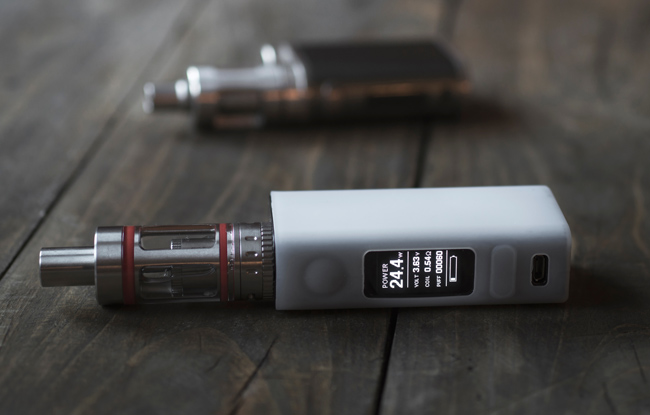 Image of a mod and tank vape kit with power settings on display