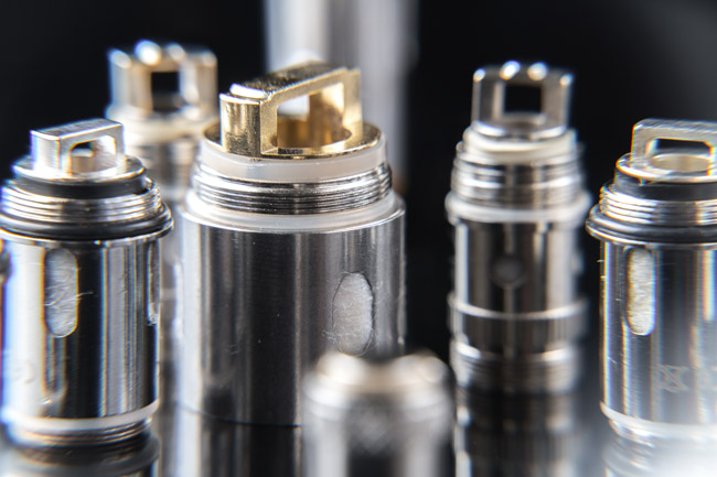 5 vape coils with the ports on display